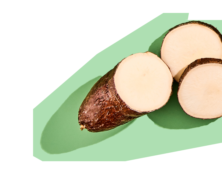 Sliced yam on a green background.